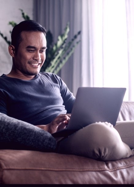 man researching business Banking on computer